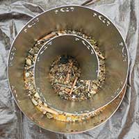 top down picture of spiral garden with drainage roughage in bottom